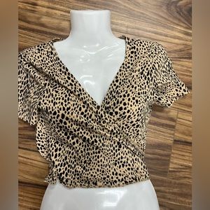 - Brandy Melville animal print wrap around top, one size fits all, gently …